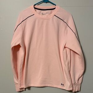 Under Armour woman’s Light Pink Crewneck Sweatshirt with black trim. Med.